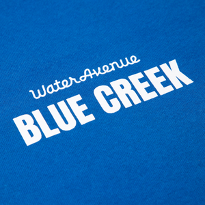 Blue Creek Crewneck front detailing (upper left chest/pocket area).
