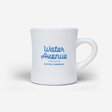 Load image into Gallery viewer, Water Avenue white diner mug with blue logo, shot from the front
